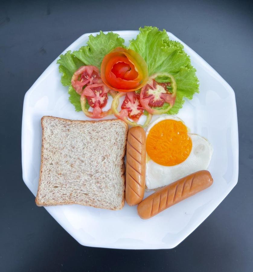 Tj Boutique Hotel Uthai Thani Bagian luar foto